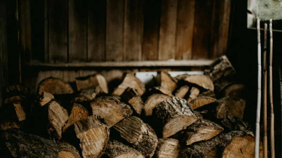 Split logs stacked under cover in a timber log store.